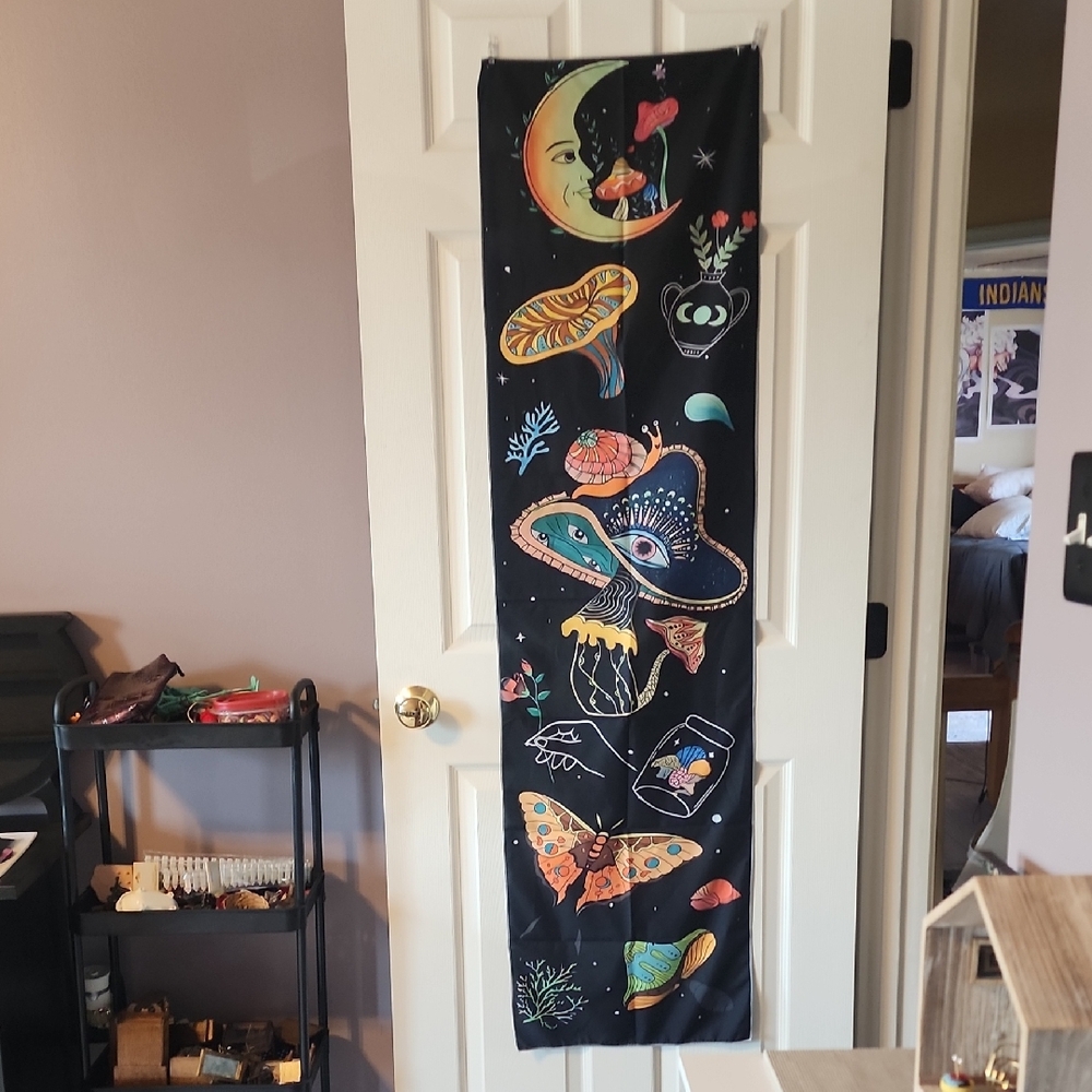 Mystical Black Wall Hanging with Colorful Cosmic Design